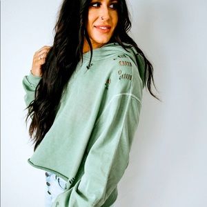 Distressed hoodie by Chelsea DeBoer